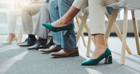 Photo for Closeup, business people and shoes with feet, job interview waiting room and nervous with opportunity. Row, group and candidates with recruitment with heels, footwear and hiring in a workplace. - Royalty Free Image