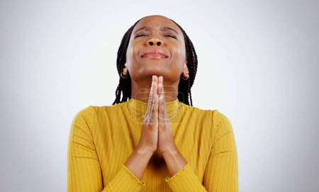 Photo for Praying, hands and black woman with stress, hope and religion with faith on white studio background. African person, girl or model with anxiety, spiritual or Christian with emoji, worship or feedback. - Royalty Free Image