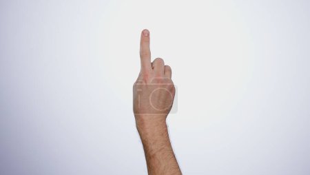 Photo for Finger, hand and click tablet in studio isolated on a white background mockup space. Closeup, touchscreen and press, scroll or swipe on digital technology, phone and gesture on mobile internet app - Royalty Free Image