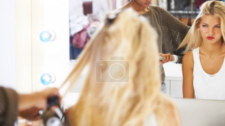 Photo for Salon, beauty and woman with hair, dryer or styling for unhappy client with bleach or cosmetics. Mirror, business and female customer frustrated with hairdresser for cut, dye or treatment results. - Royalty Free Image