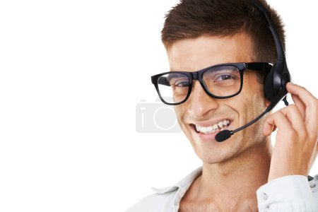 Photo for Man, smile and headset for telecommunication in studio for call centre mockup on white background in portrait. Male agent, glasses and happy for career, occupation or profession in customer service. - Royalty Free Image