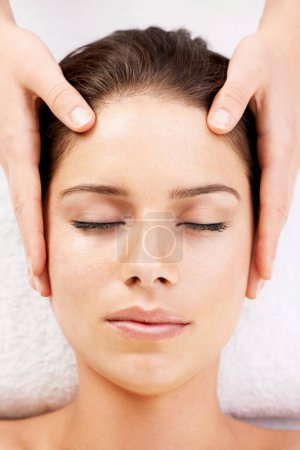 Photo for Spa massage, relax and hands on face of woman from above at a resort for stress relief or wellness. Top view, facial and female with masseuse at a beauty salon for luxury, skincare or dermatology. - Royalty Free Image