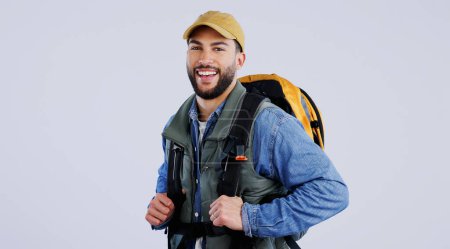Photo for Happy man, portrait and backpack on mockup for hiking, adventure or travel against a studio background. Male person, model or hiker smile with bag for trekking journey, exercise or outdoor fitness. - Royalty Free Image