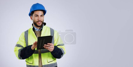 Photo for Engineering, man and tablet for design ideas, inspection or thinking of project on studio banner and mockup. Construction worker with architecture survey and digital planning on a white background. - Royalty Free Image