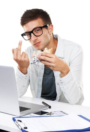Photo for Portrait of man, eating lunch and middle finger in studio isolated on a white background. Business person, sandwich and hand gesture at desk on laptop with rude sign, conflict expression and emoji. - Royalty Free Image
