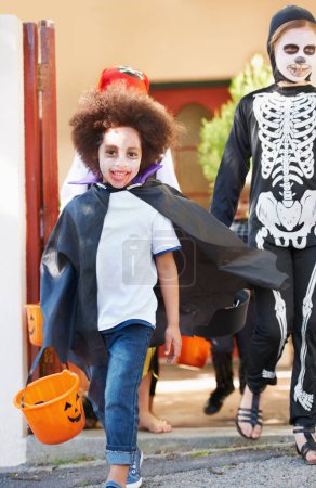 Photo for What a great costume. happy little children trick-or-treating on halloween - Royalty Free Image