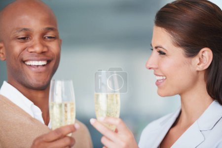 Photo for Partnership, alcohol and smile for toast, cheers and success or achievement, bonus and target. Happy people, motivation and congratulations in office, victory and celebrate with drink, goals or joy. - Royalty Free Image