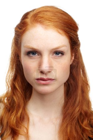 Photo for Serious, girl and woman with portrait, redhead and beauty isolated on a white studio background. Face, person and model with mockup space, confident and hair with peace, Edinburgh and ginger. - Royalty Free Image