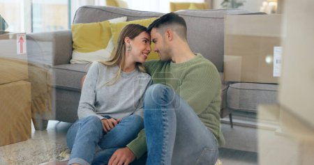 Photo for Happy couple, boxes and new home at sofa for dream house, living room or property. Man, woman and forehead embrace at couch for achievement smile or apartment change for milestone, talking or relax. - Royalty Free Image
