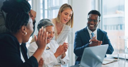 Photo for Laptop, celebration applause and business people reading project info, sales income or online achievement. Investment deal success, winner or group clap for results notification, feedback or web news. - Royalty Free Image
