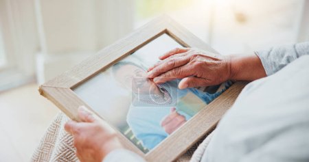 Photo for Senior woman, grief and picture of husband on lap, hands and sad of love loss in retirement. Elderly person, alone and dear memory of beloved with anxiety, mental health and lonely bereaved in house. - Royalty Free Image