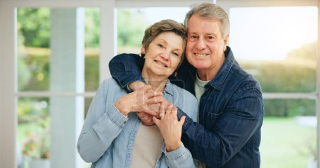 Photo for Senior couple, hug or portrait in home with loyalty, commitment or retirement as happy family. Mature man, woman or marriage for gratitude on face, embrace together or wellness for kindness in house. - Royalty Free Image