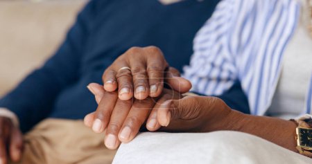 Photo for Elderly couple, love and holding hands for trust, emotional healing or support partner for empathy at home. Closeup, senior people and touch hand for care, kindness or gratitude of hope in retirement. - Royalty Free Image