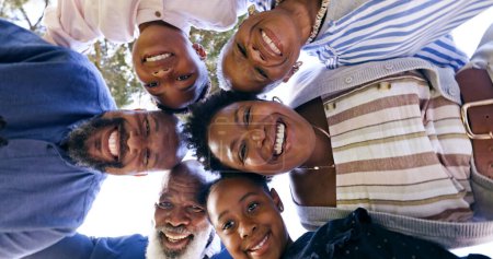 Photo for Happy family, huddle and circle portrait in nature, summer vacation and memory together with love. Black people, grandparents or parents with kids for smile, face or garden for relax bond with below. - Royalty Free Image