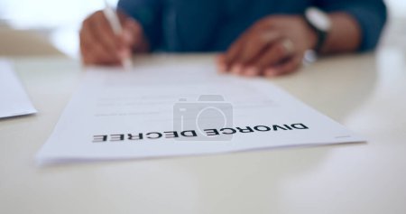 Photo for Signature, contract or document for divorce in home with legal paperwork, notary or decision in closeup. Person, hand and sad for breakup, marriage or conflict in relationship for problem by affair. - Royalty Free Image