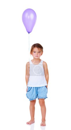 Photo for Portrait, balloon and a sad girl child feeling lonely in studio isolated on a white background for a party. Children, depression or unhappy with a young kid looking upset or miserable at a birthday. - Royalty Free Image