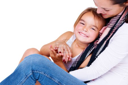 Photo for Mother, daughter and hug with happiness in studio for bonding, love and relax with peace or security. Family, woman and girl child with embrace, smile and care for parenting or relationship on mockup. - Royalty Free Image