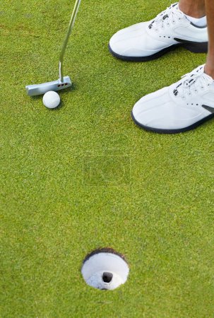 Photo for Sports, golf hole and shoes of person on course playing game, practice and training for competition. Professional golfer, grass and closeup of tee, ball and golfing club for winning stroke or score. - Royalty Free Image