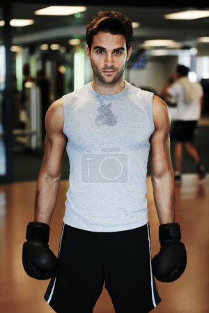 Photo for Man, boxing gloves and fitness with gym portrait for health, wellness or training for fight, performance or sport. MMA, boxer or strong for contest, competition or exercise for development with sweat. - Royalty Free Image