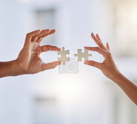 Photo for People, puzzle and hands of teamwork, problem solving and planning solution for challenge, synergy or cooperation. Closeup, collaboration and build jigsaw for integration, partnership or mockup space. - Royalty Free Image