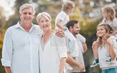 Photo for Portrait of old couple in park together with big family, grandparents and parents with kids in backyard. Nature, happiness and men, women and children in garden with love, support and outdoor bonding. - Royalty Free Image