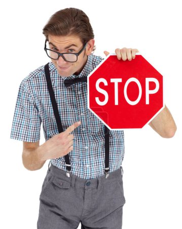 Photo for Portrait, stop sign and a man nerd pointing in studio isolated on a white background to direct traffic. Safety, law or legal with a young geek in glasses showing a road warning for speed danger. - Royalty Free Image