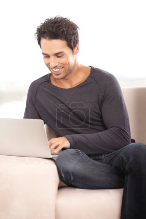 Photo for Happy man, work from home and laptop for marketing, copywriting and planning or research on website and sofa. Startup freelancer or blog writer relax on couch with computer, internet or happy project. - Royalty Free Image