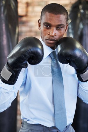 Photo for Man, portrait and boxing gloves in suit confident for manager job, ready for business or corporate competition. Black person, face and fighter gear for office achievement, career promotion at work. - Royalty Free Image