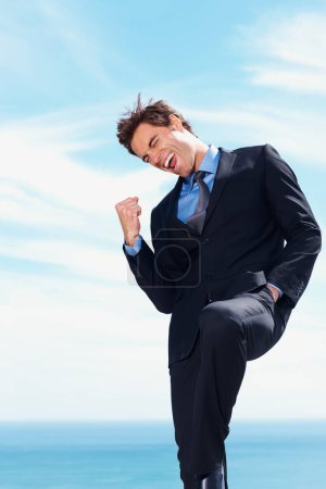 Photo for Business man, fist pump and yes for success, celebration and excited for achievement or victory. Happy businessperson, promotion and bonus or salary increase, opportunity and blue sky background. - Royalty Free Image