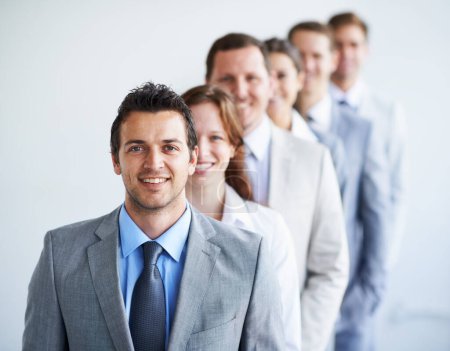 Photo for Happy man, portrait and leader with team in row, workforce, and ready for hiring process. Worker, corporate accountant in suit and professional in workplace, people in background and confident. - Royalty Free Image