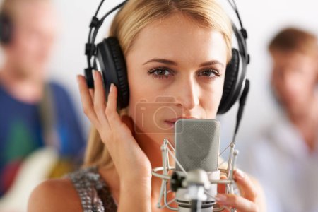 Photo for Music, portrait and woman with microphone, headphones and band performance with talent. Recording studio, art and girl musician live streaming, singing for record label with sound and audio singer - Royalty Free Image
