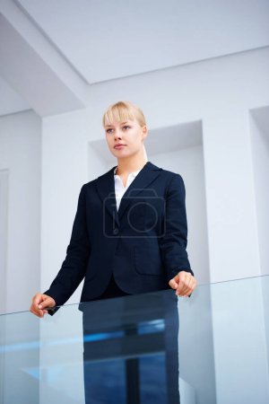 Photo for Businesswoman, thinking and confidence in office building for corporate company vision, brainstorming for professional growth. Female person, thoughts and strategy for future goal, mission for pride. - Royalty Free Image
