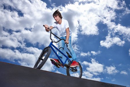 Photo for Ride, ramp and man with bike at park, event or competition for sport with risk, energy and freedom. Mockup, space or person in performance of stunt trick on bicycle for fun in summer with adventure. - Royalty Free Image