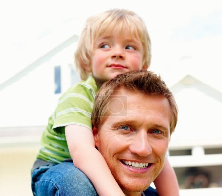 Photo for Father, son and smile outdoor with piggyback for bonding, relationship and freedom in garden of home. Family, man or boy child with playing, care and love for happiness, peace and support in backyard. - Royalty Free Image