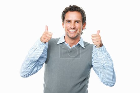 Photo for Smile, thumbs up and mature businessman in studio with approval, good and agreement expression. Happy, portrait and professional male person with positive hand gesture isolated by white background - Royalty Free Image