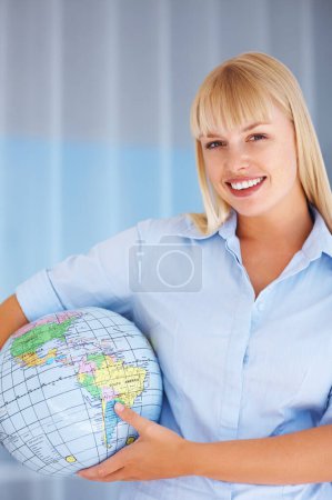 Photo for Portrait, smile and business woman with globe, earth day and map for corporate travel agent. Face, professional and planet world, environment conservation or future protection, ecology or geography. - Royalty Free Image