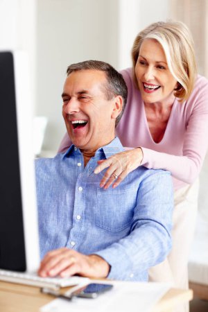 Photo for Financial, laughing or mature couple with computer in home for retirement savings or pension budget. Planning, funny joke or man talking to happy woman for house bills, profit growth or news research. - Royalty Free Image
