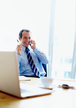 Photo for Businessman, happy and phone call for discussion in modern office for consultation, communication or planning. Corporate, male manager or smile with technology for online, conversation or connection. - Royalty Free Image