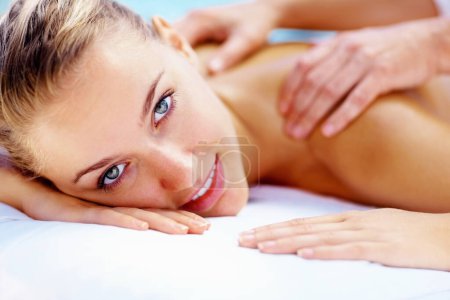 Photo for Woman, portrait and smile at spa for back massage wellness cosmetics or holistic therapy at holiday resort. Beauty salon, skincare and face of client relax for shoulder treatment, healing or vacation. - Royalty Free Image