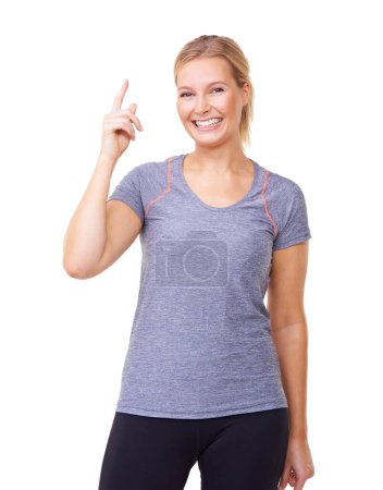 Photo for Portrait, woman or pointing for fitness, studio or gym announcement with exercise wellness. Person, smile face and emoji with giveaway on training gear, health body and promotion by white background. - Royalty Free Image