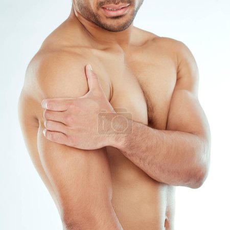 Photo for Shoulder pain, hands and fitness man in studio with muscle problem, arthritis or fibromyalgia on white background. Arm, injury and athletic male model with osteoporosis, stress or sports mistake. - Royalty Free Image