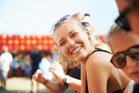 Photo for Outdoor, portrait or happy woman in music festival on holiday vacation to relax on New Year. Carnival, crowd or people with freedom, smile or youth culture for concert or fun party celebration event. - Royalty Free Image