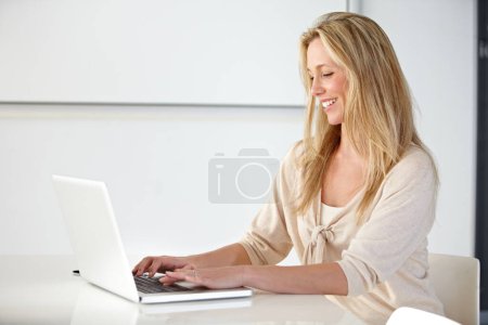 Photo for Business woman, laptop and typing in office at desk for online research, website review or planning social network connection in creative startup. Happy employee working at computer in digital agency. - Royalty Free Image