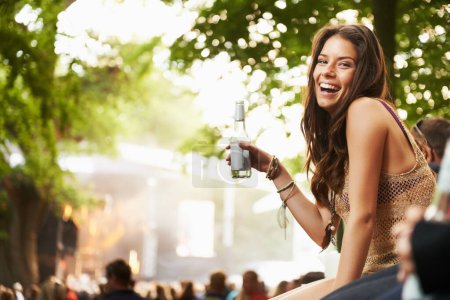 Photo for Happy woman, portrait or laughing with drink at music festival, event or outdoor party in nature. Female person smile with alcohol enjoying sound or DJ performance at concert, carnival or summer fest. - Royalty Free Image