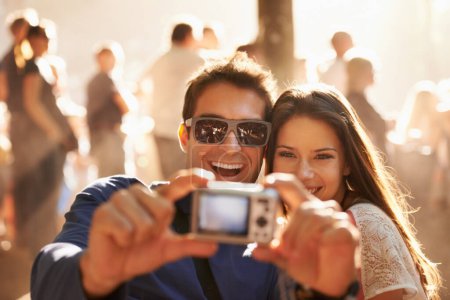 Photo for Happy couple, camera and selfie at music festival for memory, photography or picture in outdoor crowd. Excited man and woman smile for photograph, photo or capture at party, carnival or summer fest. - Royalty Free Image