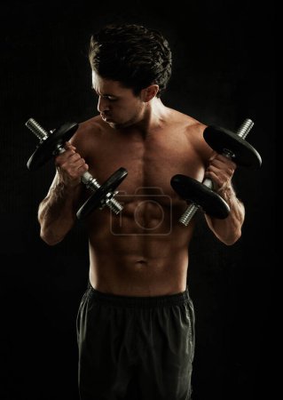 Photo for Dumbbells, black background or topless bodybuilder in exercise, strength training or workout in studio. Fitness model, dark or ripped man with healthy body, weights or biceps muscle for lifting power. - Royalty Free Image