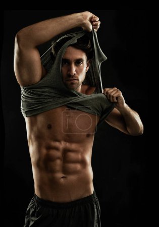 Photo for Portrait, black background or man undress with six pack, strong abs or stomach in studio for fitness. Off, cool model or ripped person with healthy body, dark shadow or abdomen muscle for wellness. - Royalty Free Image