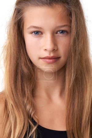 Photo for Studio portrait, hair care and teen kid with facial cosmetics, hairdressing maintenance and youth with natural texture growth. Beauty, grooming and girl with haircut routine on white background. - Royalty Free Image