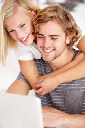 Photo for Laptop, hug and a young couple in their apartment for accounting or budget planning together. Computer, love or banking research with a happy man and woman in their home for investment growth. - Royalty Free Image