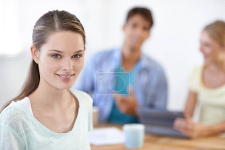 Photo for Smile, portrait and young woman in meeting in office for project planning or brainstorming. Happy, team and closeup of professional female designer from Australia working with paperwork in workplace - Royalty Free Image